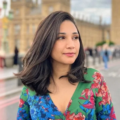 Portrait of Michelle Brito on the Human x Intelligent podcast